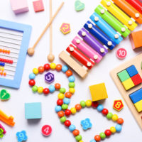 Colorful,Kids,Toys,On,White,Background.,Top,View,,Flat,Lay.